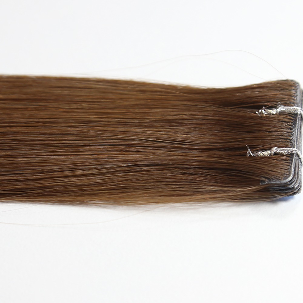 Invisible tape extensions i äkta hår